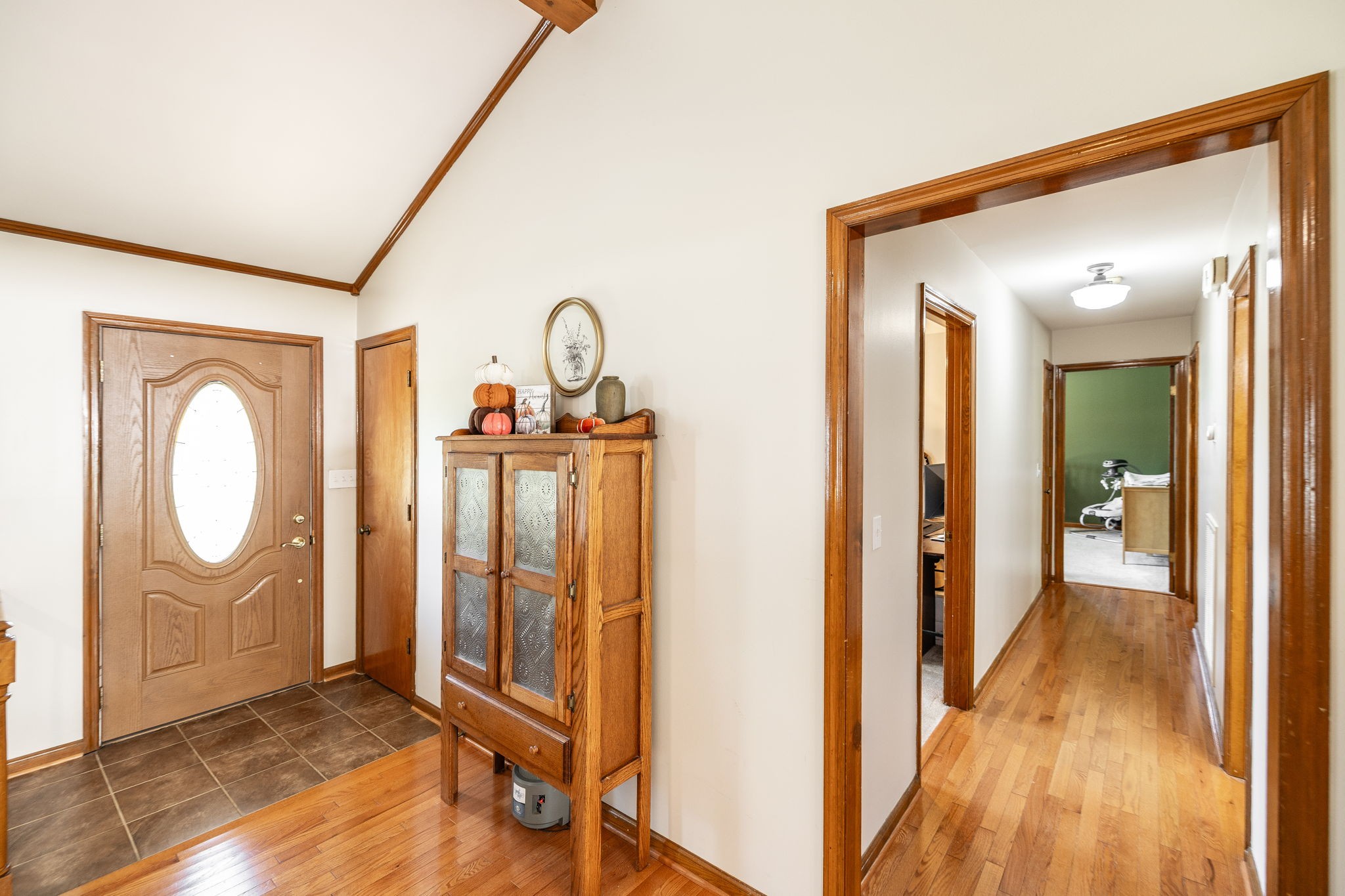 2714 Morgan Road Joelton, TN 37080 - Photo 31 of 78 a view of a hallway with wooden floor and a bathroom