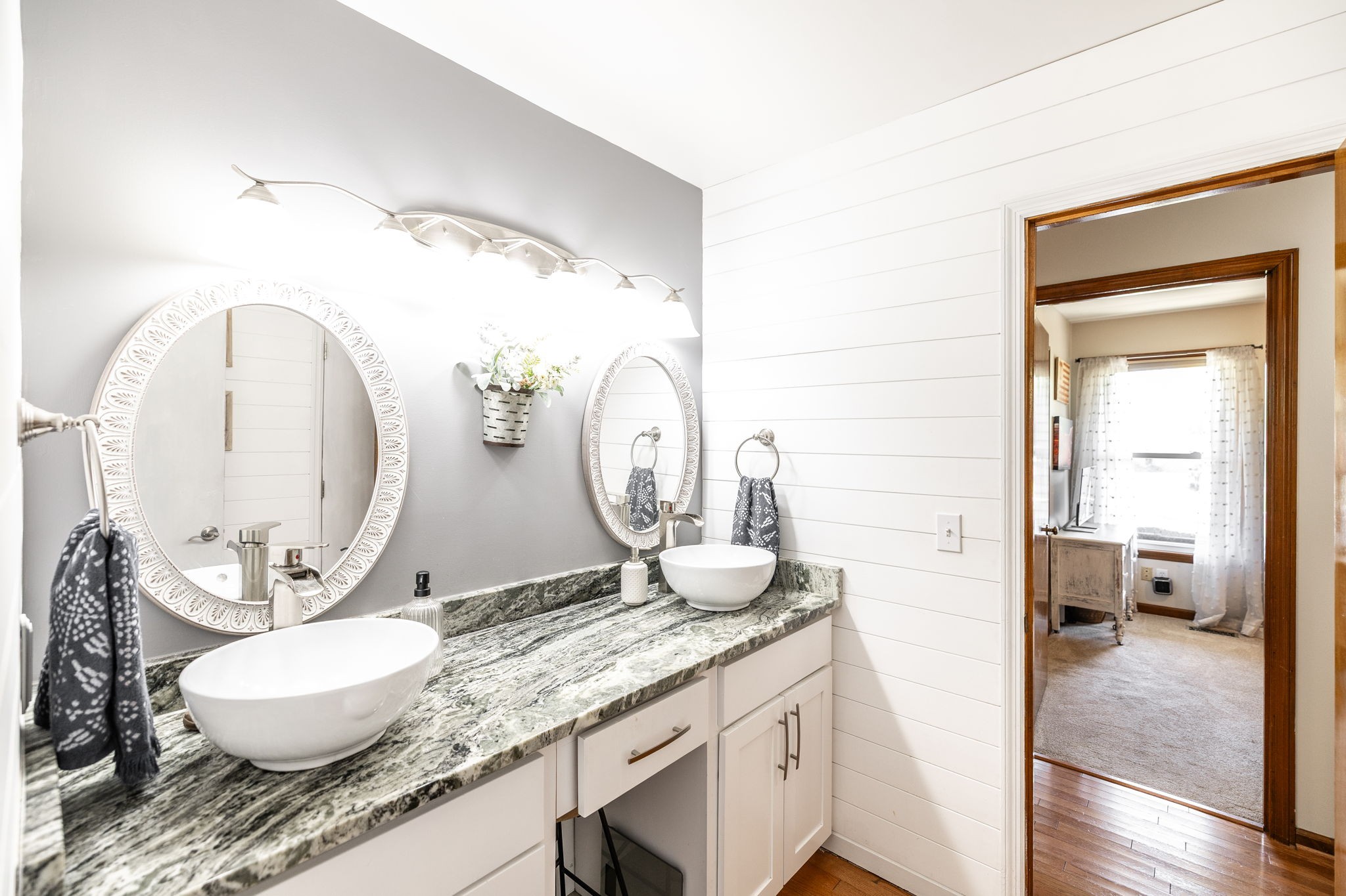 2714 Morgan Road Joelton, TN 37080 - Photo 34 of 78 a en suite bathroom with a granite countertop sink and a mirror