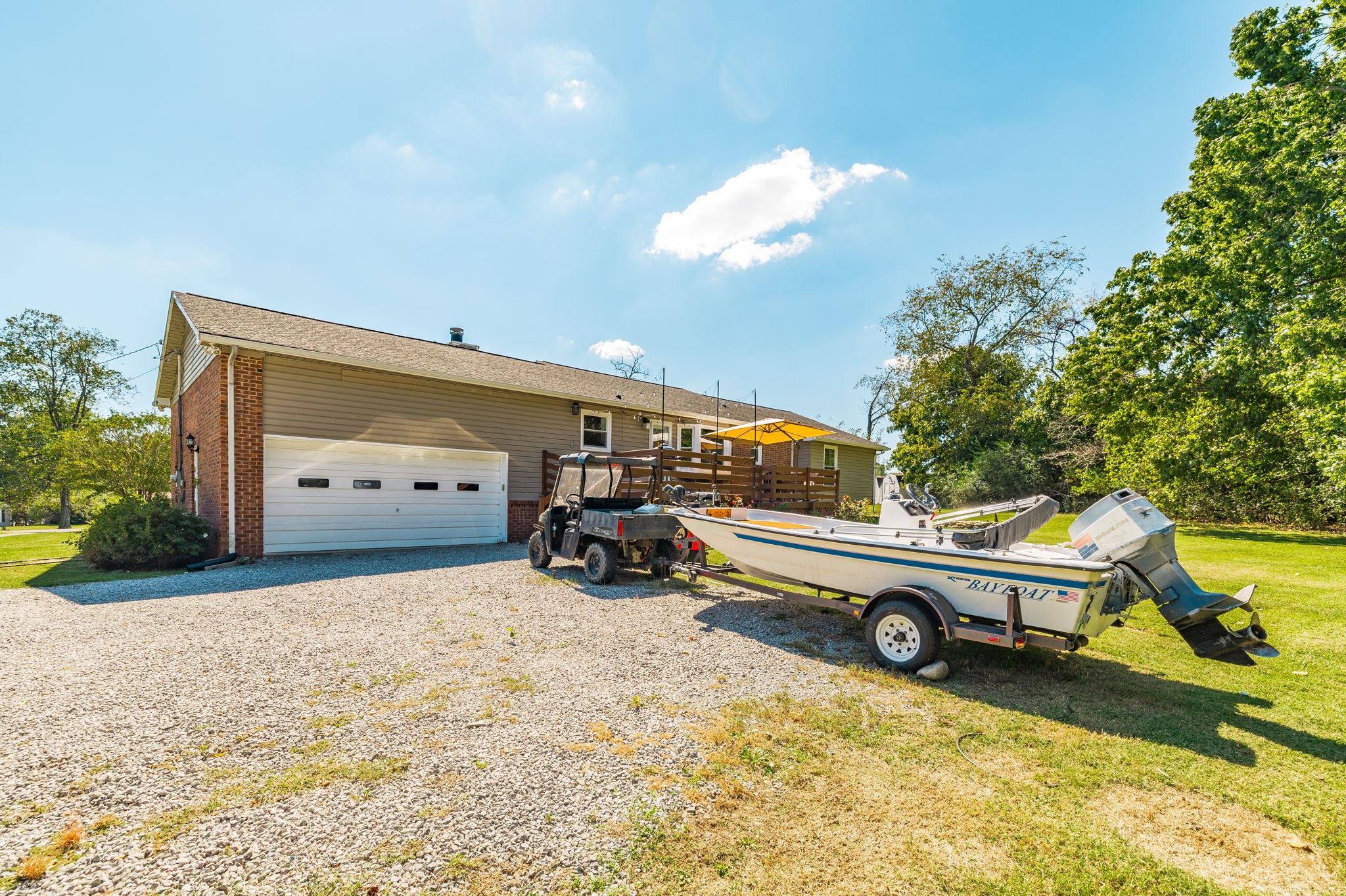 2714 Morgan Road Joelton, TN 37080 - Photo 62 of 78 a car parked in front of a house with a yard