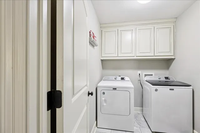 a backyard of a house with yard and outdoor seating