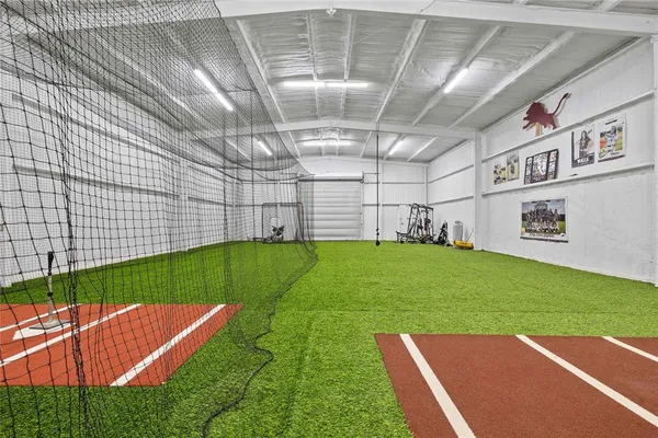 a view of a backyard with table and chairs