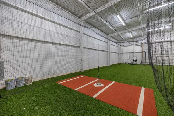 a view of a car park in front of house