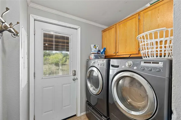 a bedroom with furniture and a chandelier