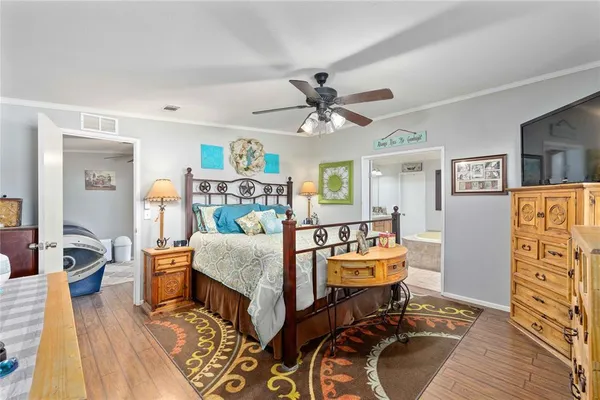 a bathroom with a sink a mirror and a shower