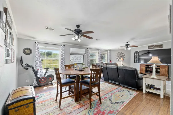 a kitchen with refrigerator and cabinets