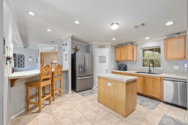 a view of a hall with wooden floor
