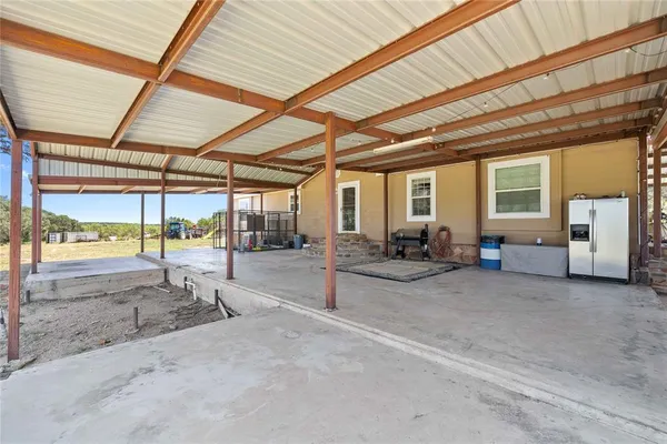 a view of a garage with storage