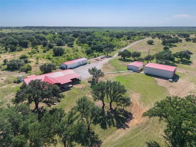 a view of a yard with an outdoor space