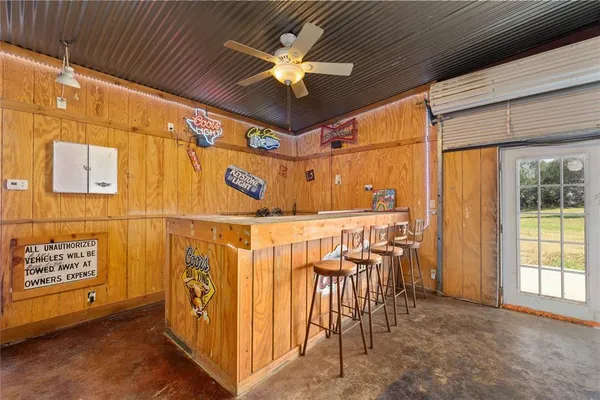 a view of a hallway with a chandelier