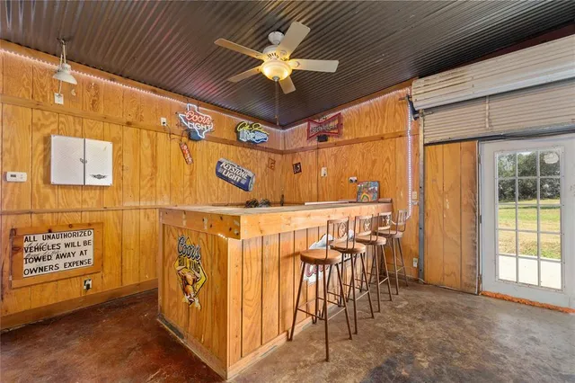 a view of a hallway with a chandelier