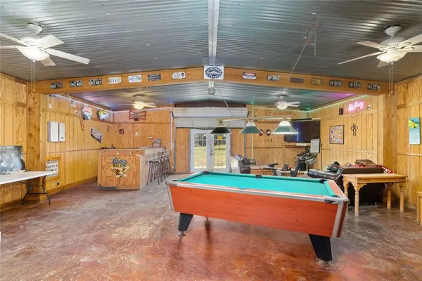 a view of a big room with pool