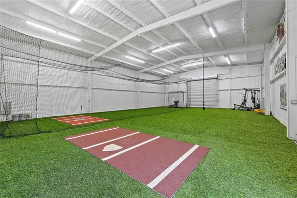 a view of a backyard of the house