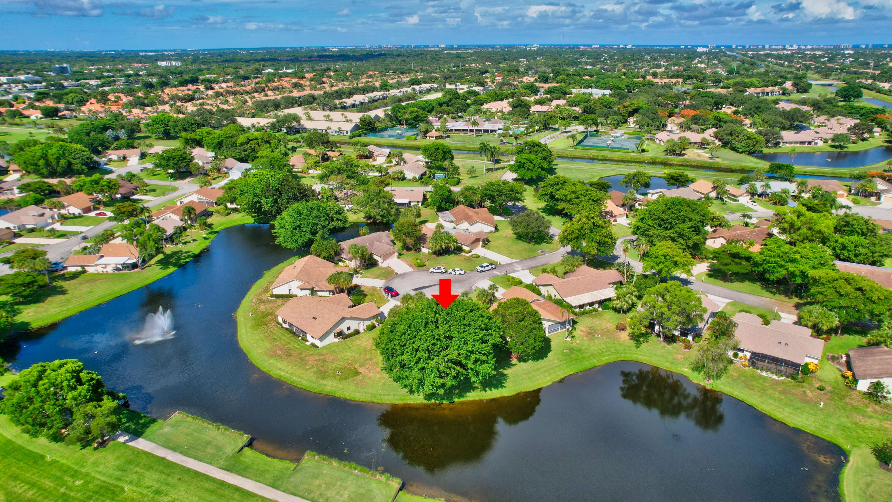 5642 Forest Oaks Terrace Delray Beach, FL 33484 - Photo 18 of 37 an aerial view of a house