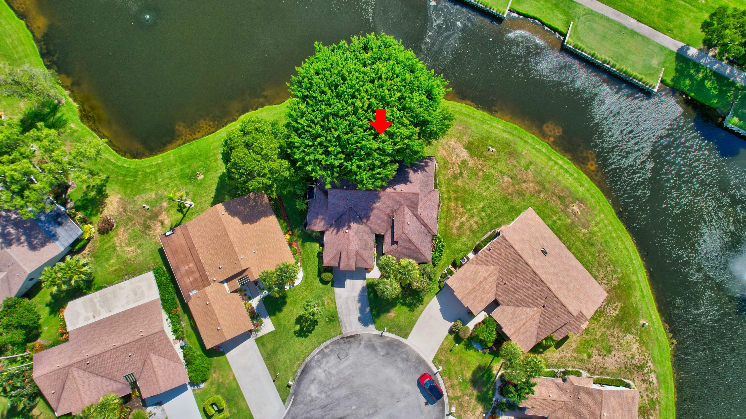 5642 Forest Oaks Terrace Delray Beach, FL 33484 - Photo 22 of 37 an aerial view of a house