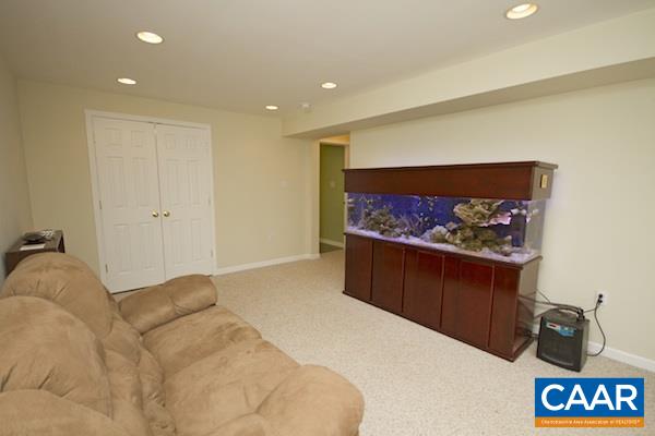 330 Northridge Road Ruckersville, VA 22968 - Photo 24 of 36 a bedroom with a bed and wall painting