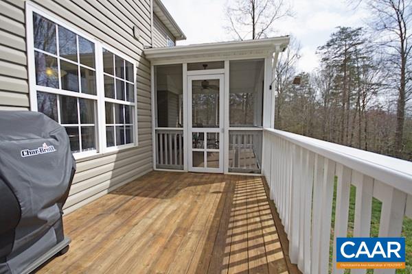 330 Northridge Road Ruckersville, VA 22968 - Photo 30 of 36 a view of a balcony with wooden floor and fence
