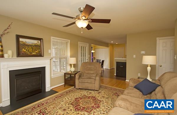 330 Northridge Road Ruckersville, VA 22968 - Photo 5 of 36 a living room with furniture and a fireplace