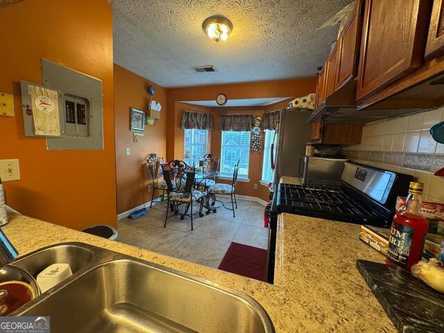 6444 Charter Way Lithonia, GA 30058 - Photo 5 of 18 a view of a swimming pool with chairs
