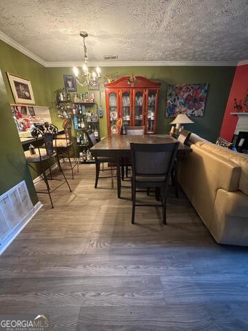 6444 Charter Way Lithonia, GA 30058 - Photo 6 of 18 a view of a dining room with furniture and chandelier