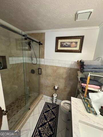 6444 Charter Way Lithonia, GA 30058 - Photo 10 of 18 a bathroom with a granite countertop toilet a sink and shower