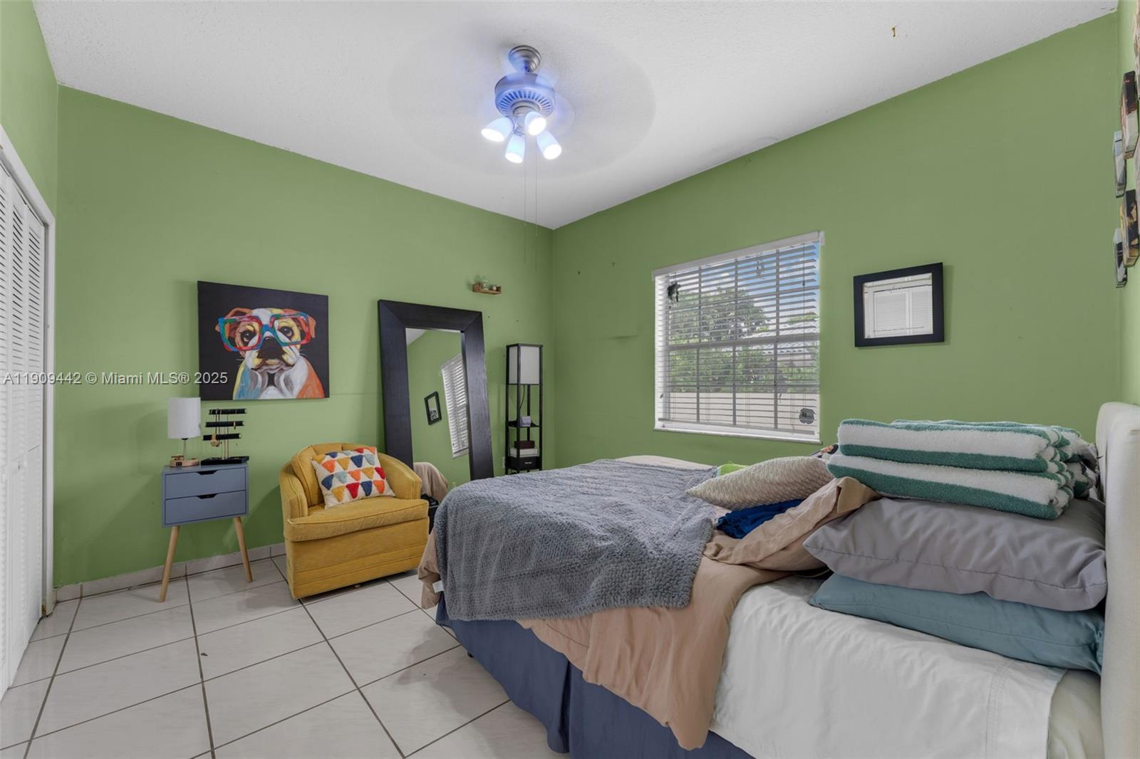 3200 Southwest 132nd Avenue Miami, FL 33175 - Photo 18 of 55 a bedroom with a bed and a window