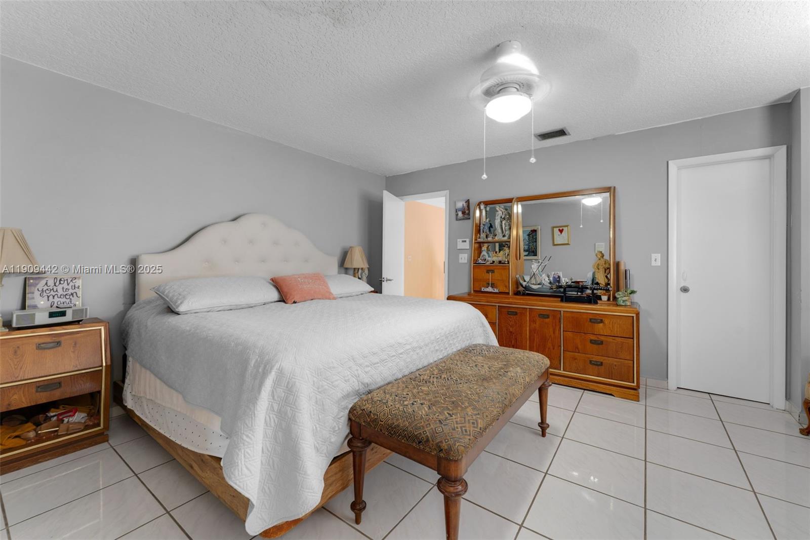 3200 Southwest 132nd Avenue Miami, FL 33175 - Photo 22 of 55 a bedroom with a bed and a view of hallway