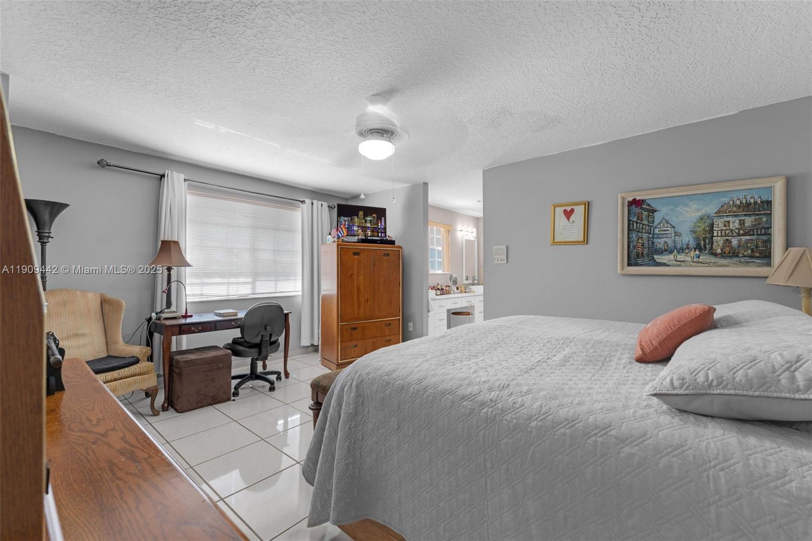 3200 Southwest 132nd Avenue Miami, FL 33175 - Photo 23 of 55 a bedroom with a bed and furniture