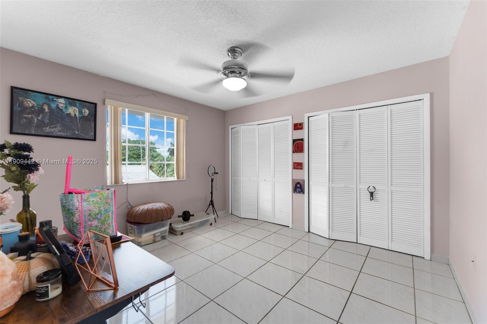 3200 Southwest 132nd Avenue Miami, FL 33175 - Photo 28 of 55 a view of a workspace with furniture and a window