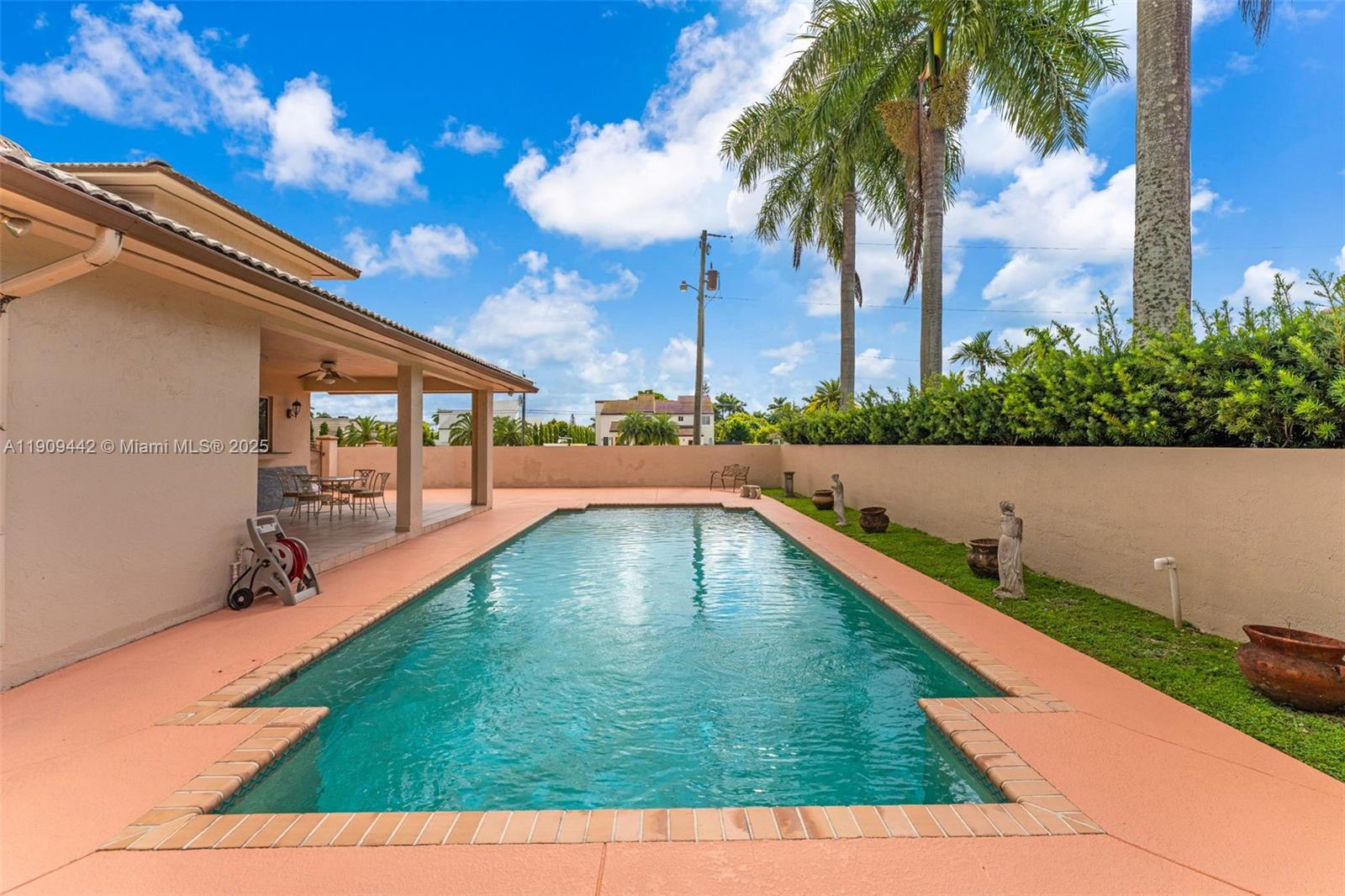 3200 Southwest 132nd Avenue Miami, FL 33175 - Photo 38 of 55 a view of swimming pool with a yard