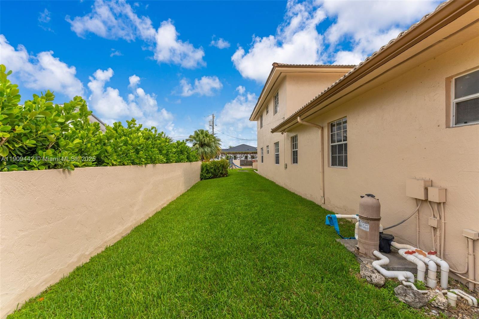 3200 Southwest 132nd Avenue Miami, FL 33175 - Photo 39 of 55 a view of a white house with a yard