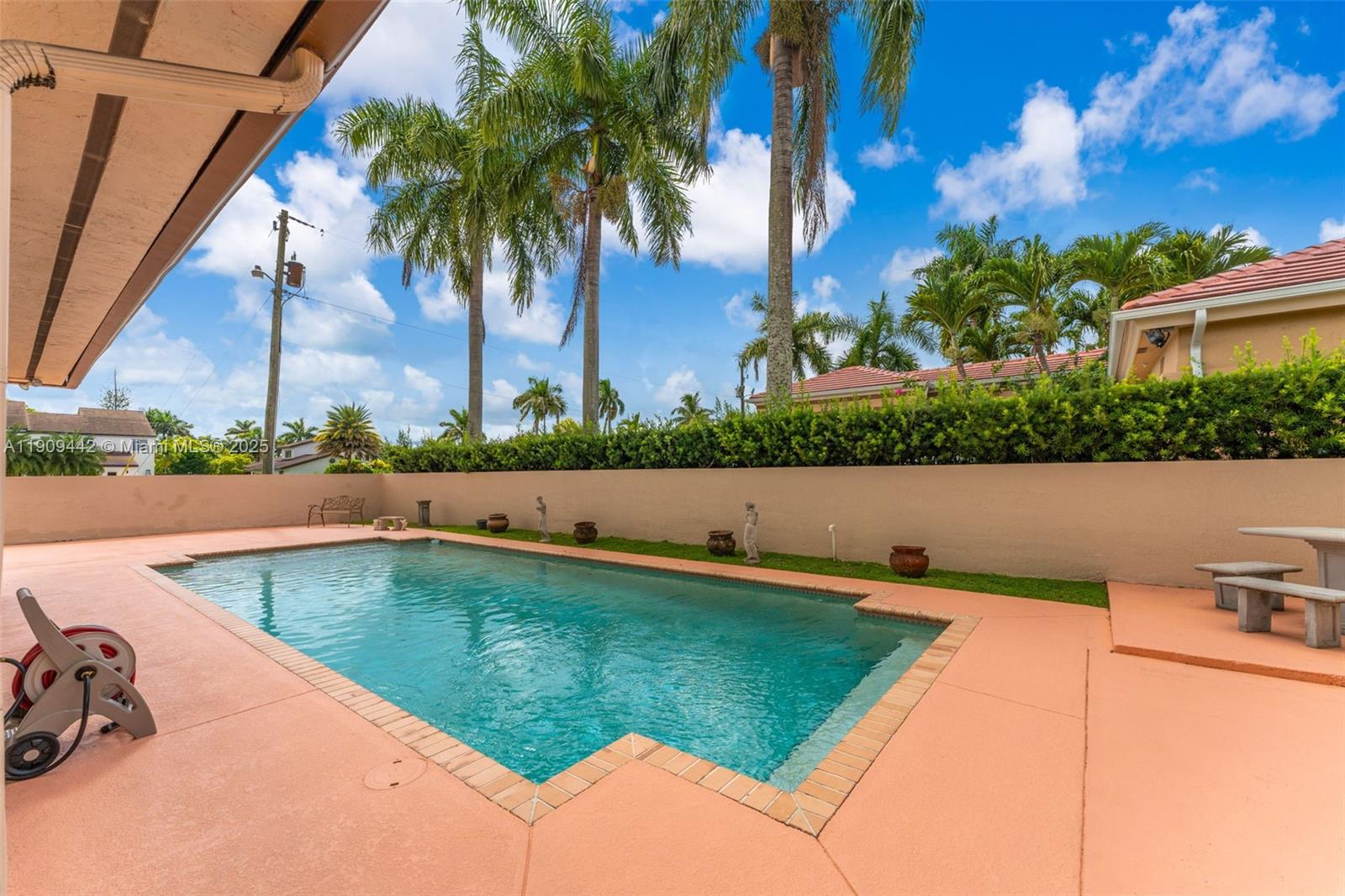 3200 Southwest 132nd Avenue Miami, FL 33175 - Photo 40 of 55 a view of a swimming pool and lounge chair