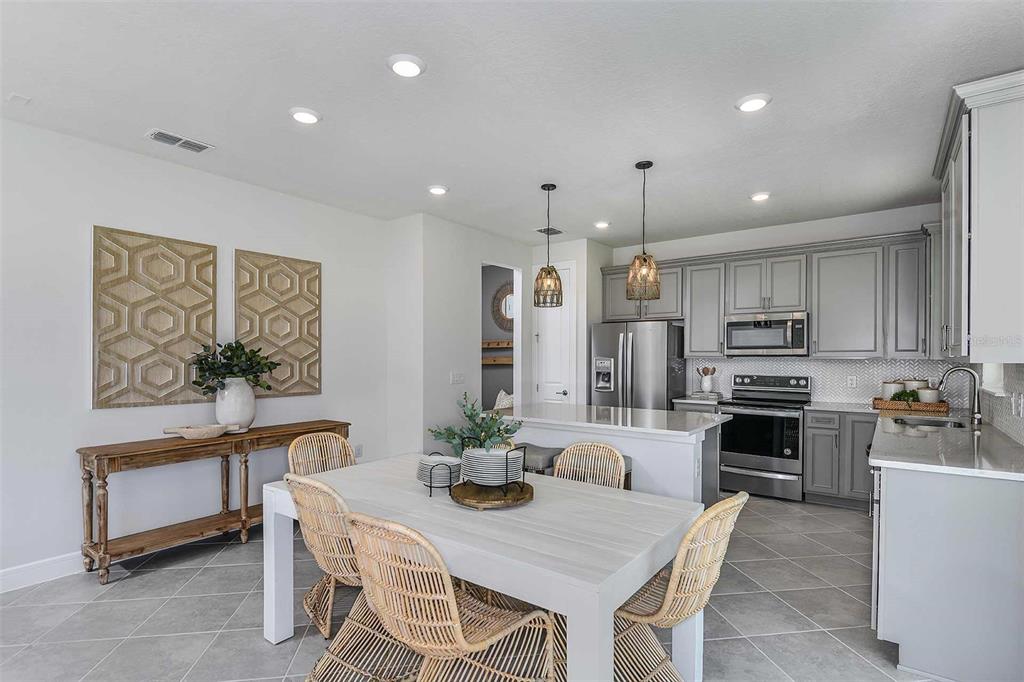 1844 Groveline Road St. Cloud, FL 34771 - Photo 27 of 44 Model Home Design Only. Pictures and furnishings are for illustrative purposes only. Elevations, colors and options may vary. Furniture is for model home staging only.