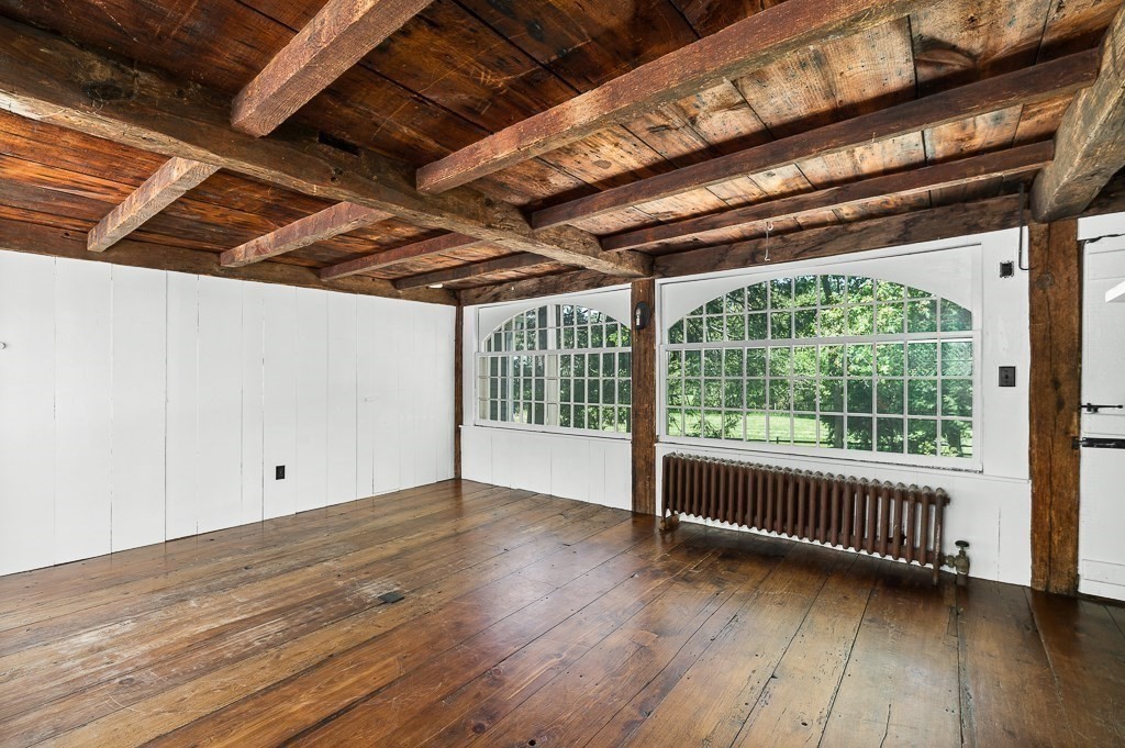 48 Topsfield Road Boxford, MA 01921 - Photo 15 of 34 a view of a room with wooden floor and roof