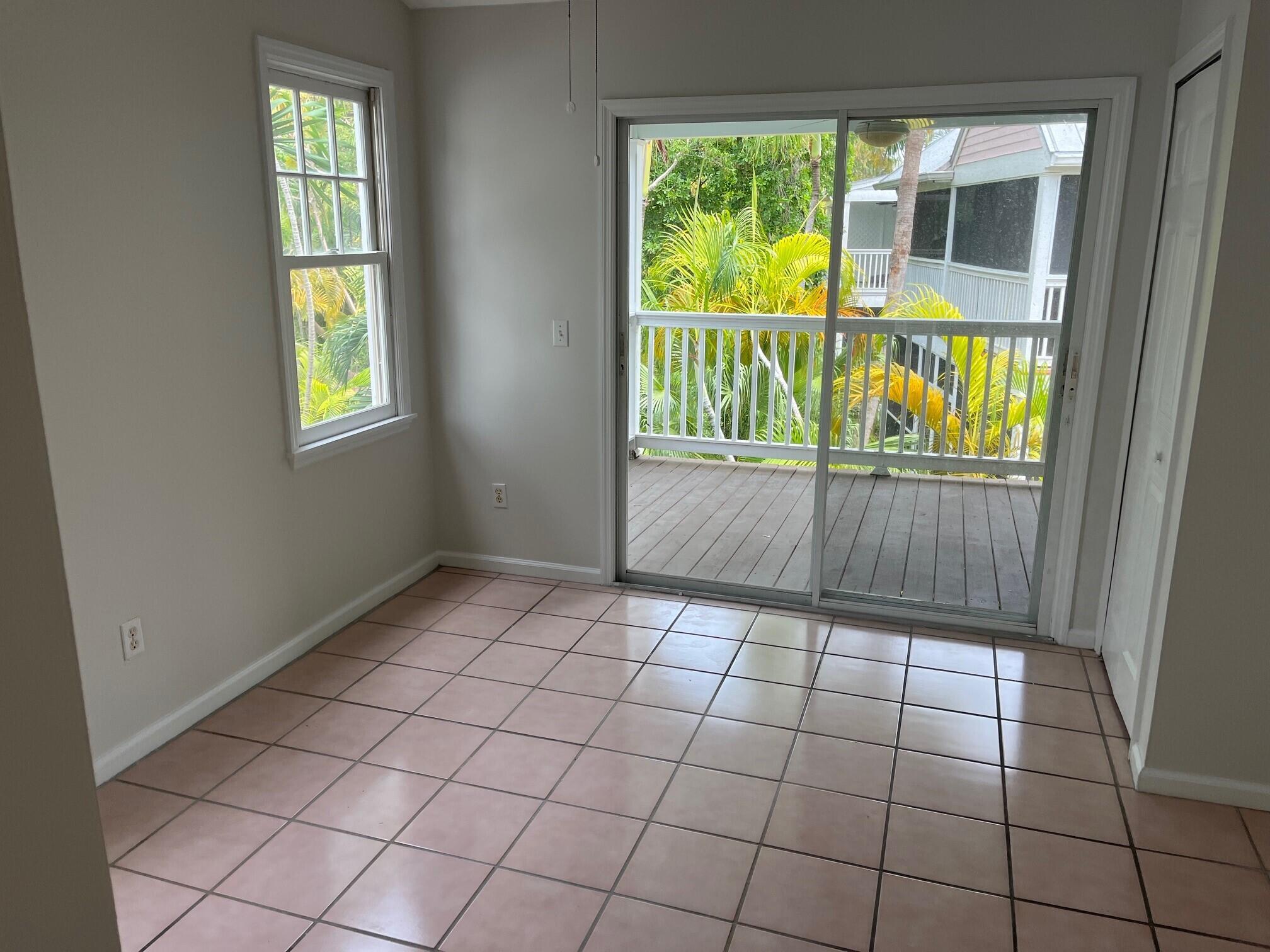 8 Kestral Way Key West, FL 33040 - Photo 4 of 4 an empty room with windows