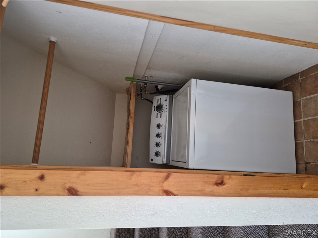 26432 Tamarisk Street, Unit STREET Meadview, AZ 86444 - Photo 12 of 60 Laundry area featuring washer