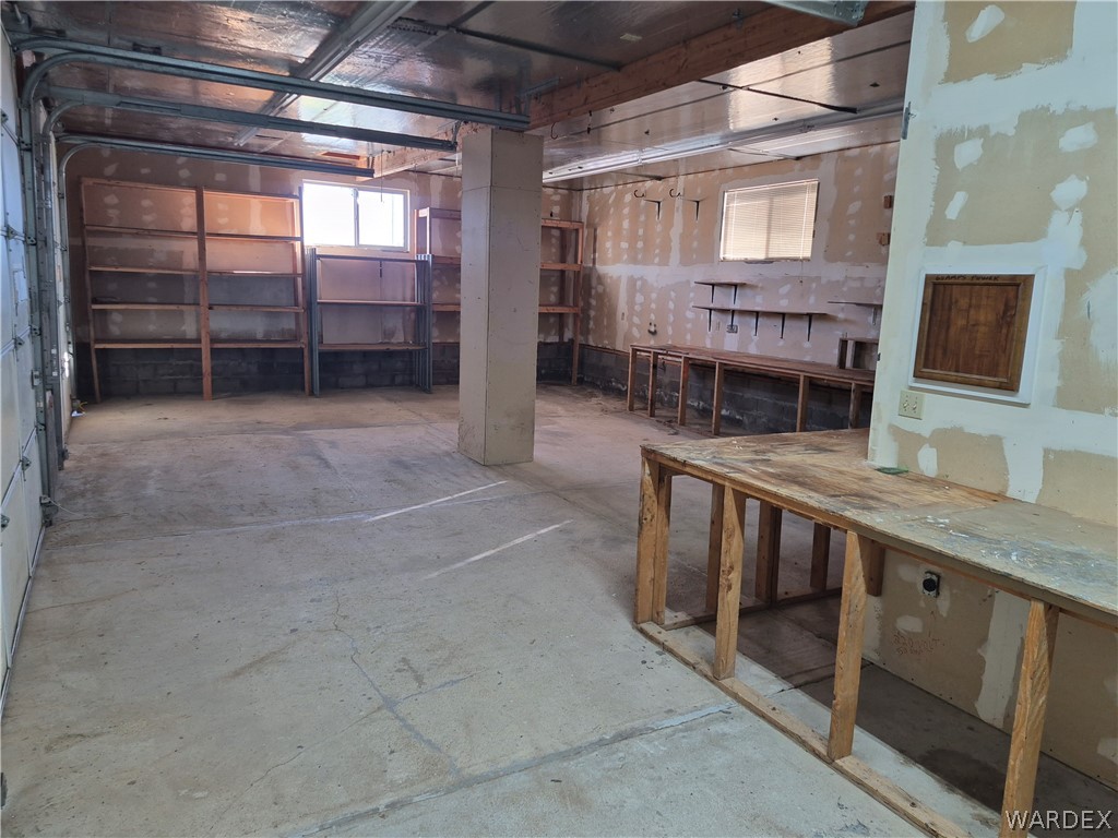 26432 Tamarisk Street, Unit STREET Meadview, AZ 86444 - Photo 53 of 60 20x40 Garage with built in shelving