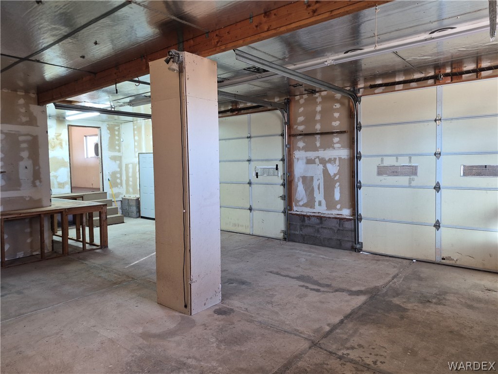 26432 Tamarisk Street, Unit STREET Meadview, AZ 86444 - Photo 54 of 60 20x40 Garage with built in shelving