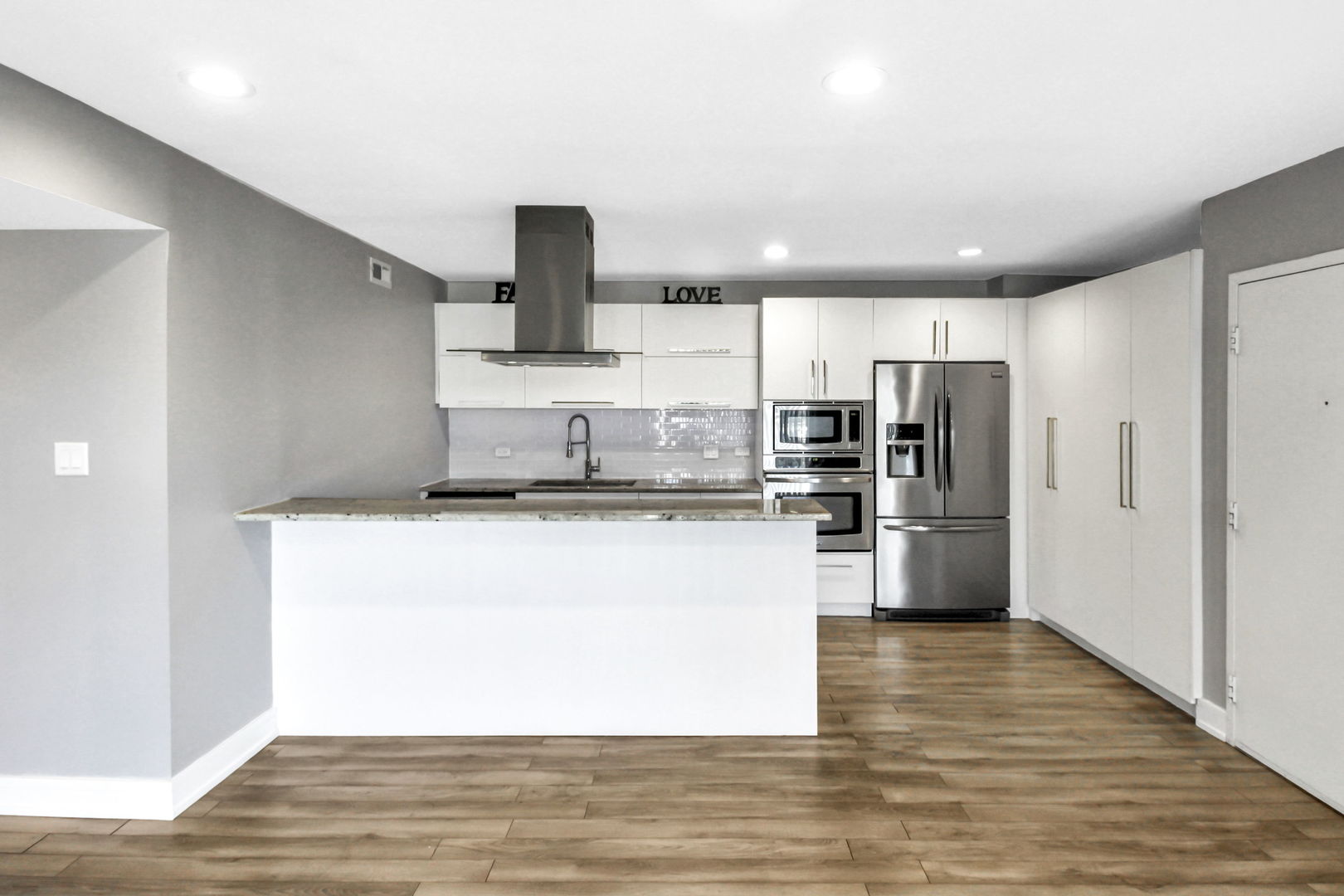 16622 Theresa Lane, Unit 304 Tinley Park, IL 60477 - Photo 8 of 16 a kitchen with stainless steel appliances granite countertop a refrigerator a stove and a sink