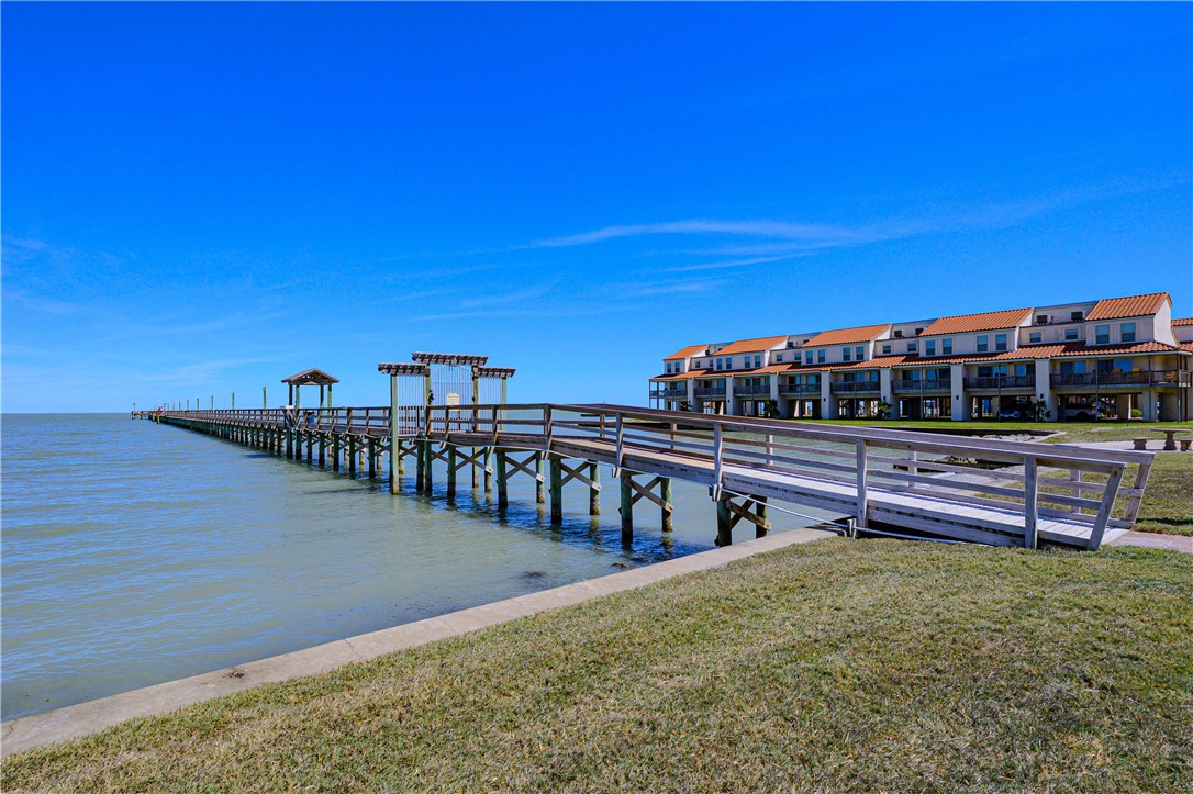 620 Fulton Beach Road, Unit 708 Rockport, TX 78382 - Photo 32 of 38 a view of a balcony with two chairs