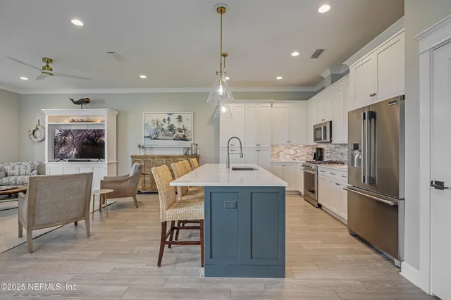 a bedroom with a bed and ceiling fan