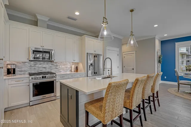 a bedroom with a balcony a bed and a couch