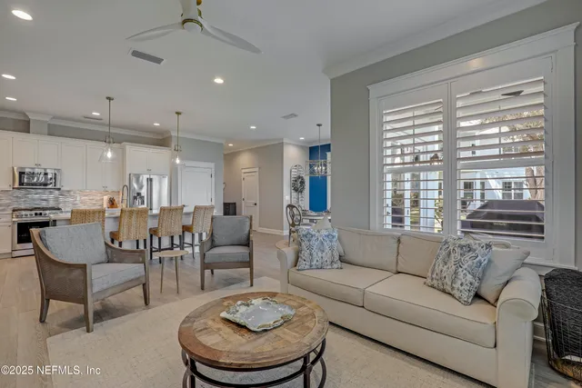 a spacious bathroom with a tub shower and window