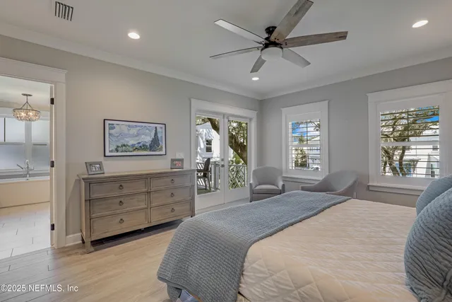 a front view of a house with a garden and yard