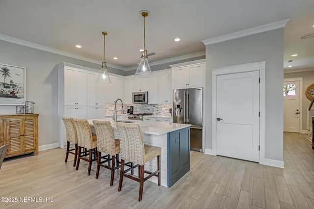 a backyard of a house with a garden and plants