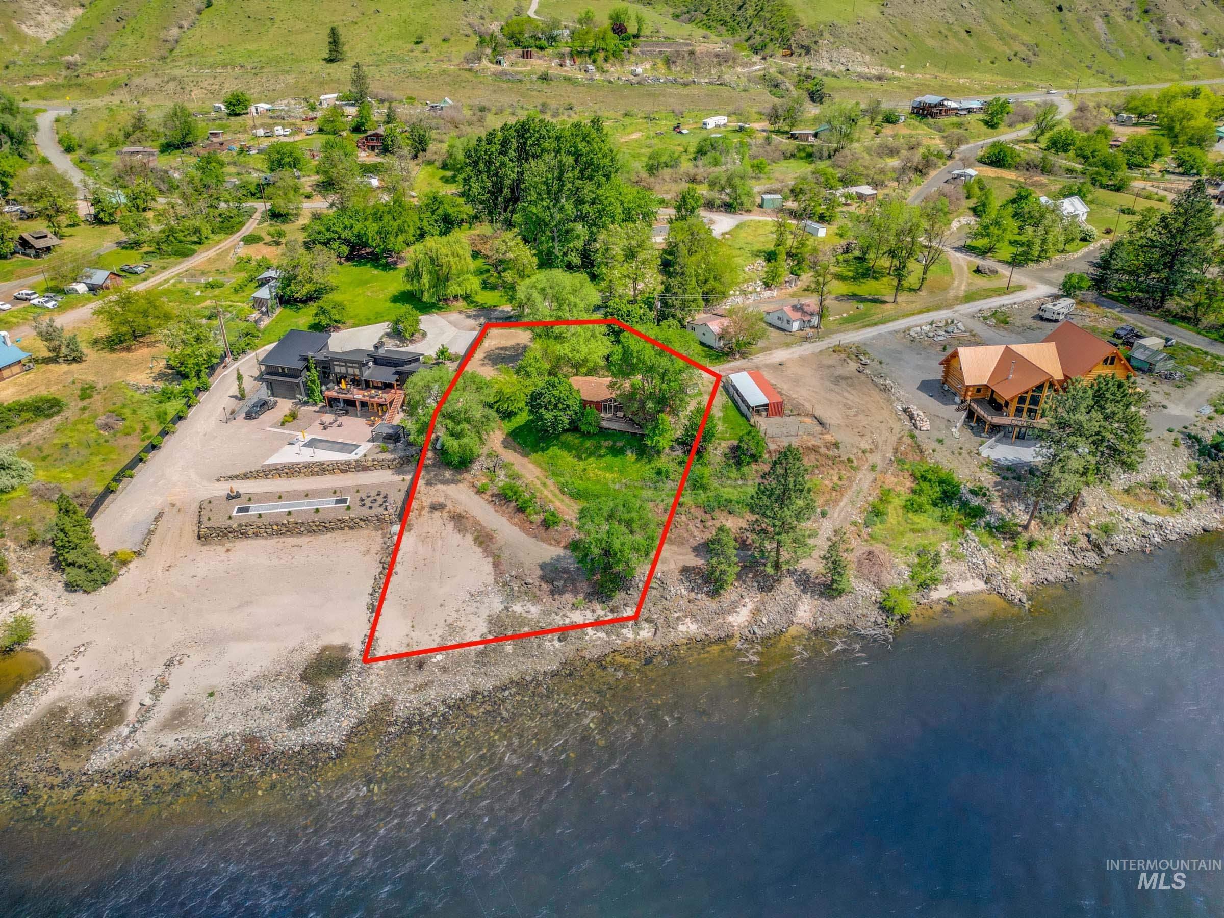 151 Cow Creek Road Lucile, ID 83542 - Photo 2 of 50 Waterfront property featuring a private beach and direct water access