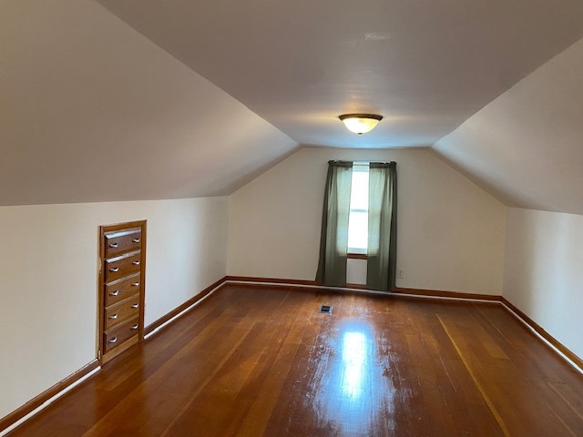 412 West 2nd Street Lostant, IL 61334 - Photo 10 of 22 wooden floor in an empty room with a window