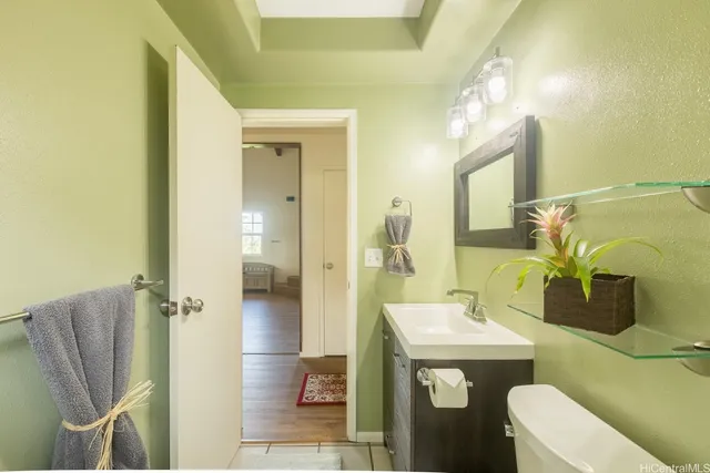 a utility room with sink dryer and washer