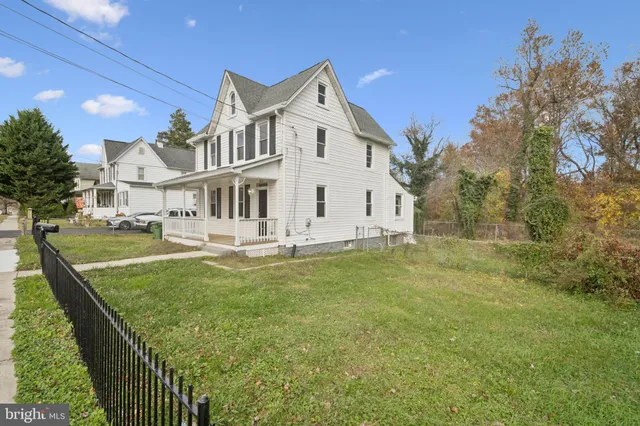 a front view of a house with swimming pool