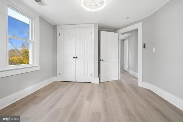 a view of an empty room and window