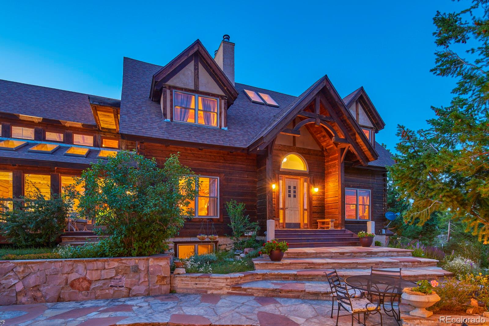 2847 Ridge Road Nederland, CO 80466 - Photo 1 of 40 a front view of a house with a yard